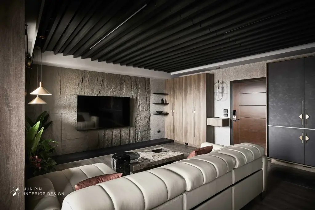 現代工業風電視牆用石皮造型打造洞穴風