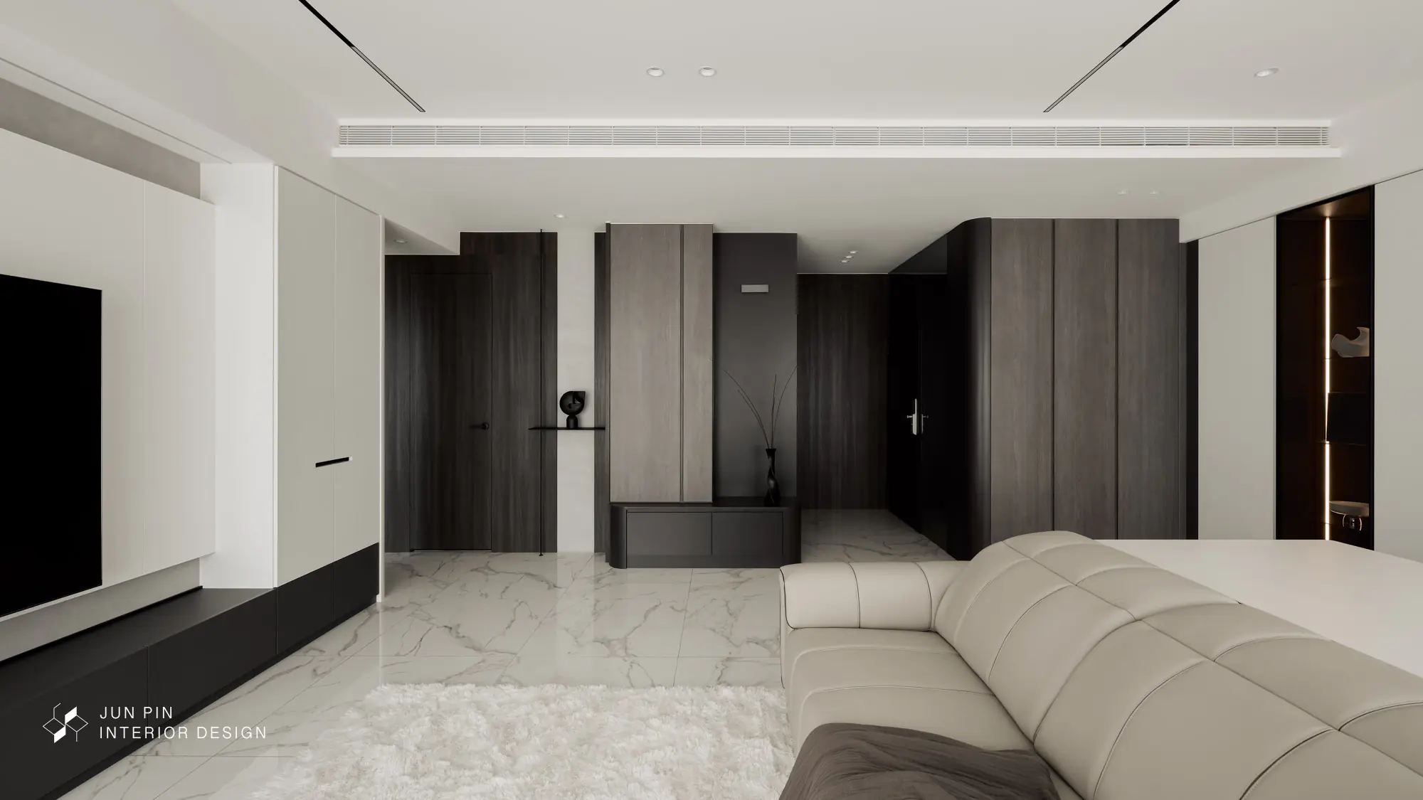 喜歡屋主現代風格的屋主，期望家在用色上也是以簡單的黑白灰為主，並希望家中有完善的收納功能，能將所有的雜物都收起來，以便日後打掃方便，但卻又不希望太多櫃體影響空間視覺，所以設計師就使用最基礎的黑白灰作為空間配色，並設置了許多隱藏式收納，讓空間看起來線條乾淨、簡約，卻有足夠的收納空間。